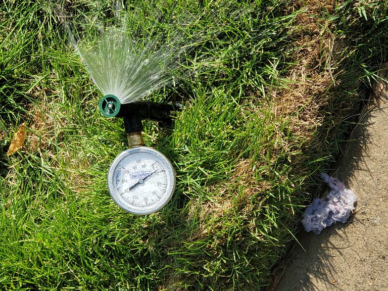 Irrigation system inspection using pressure gauge in Plano Texas